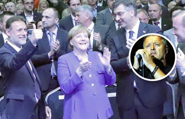 Angela-Merkel-applaudiert-zu-Thompson-Song