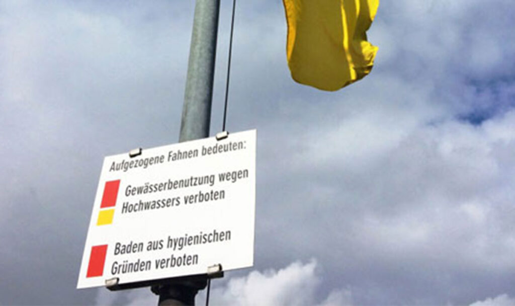 stadt-wien-fahnen-hoch-wasser-wien-alte-neue-donau-insel-schutz-regen-unwetter
